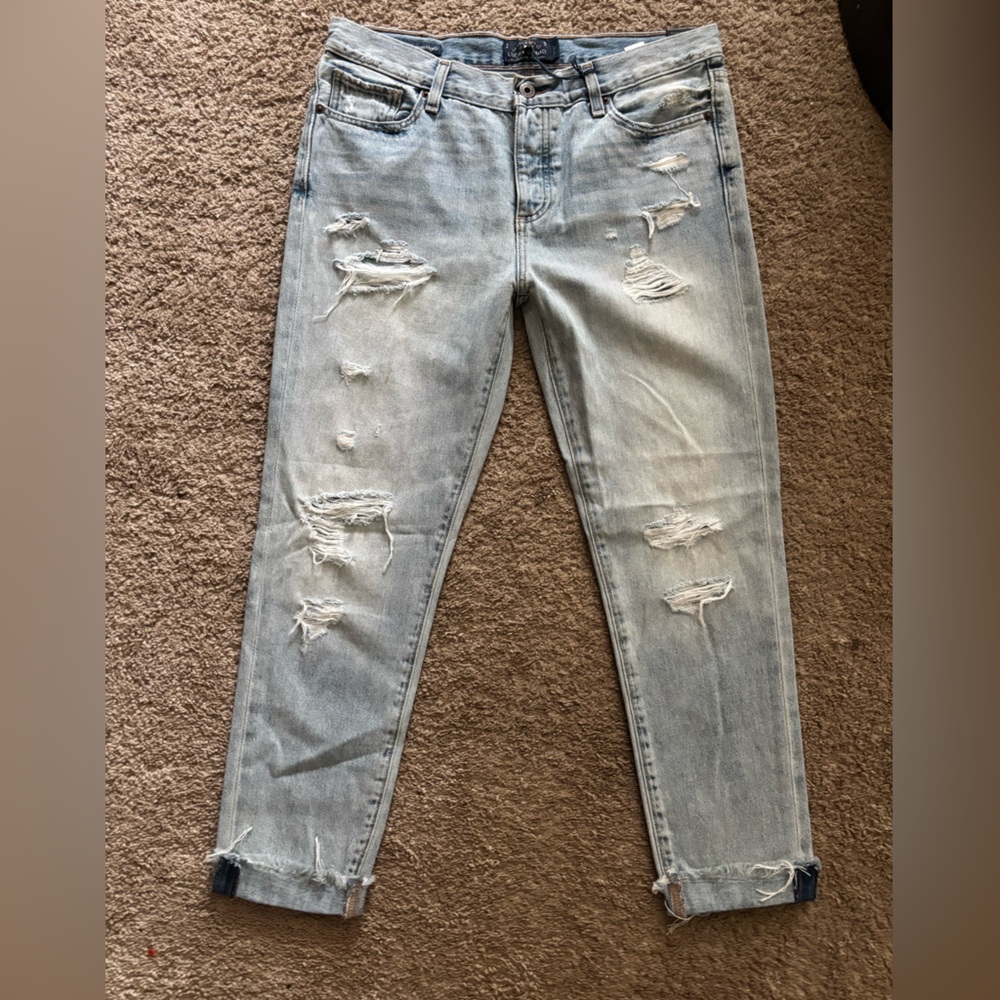 Distressed Light Blue Jeans